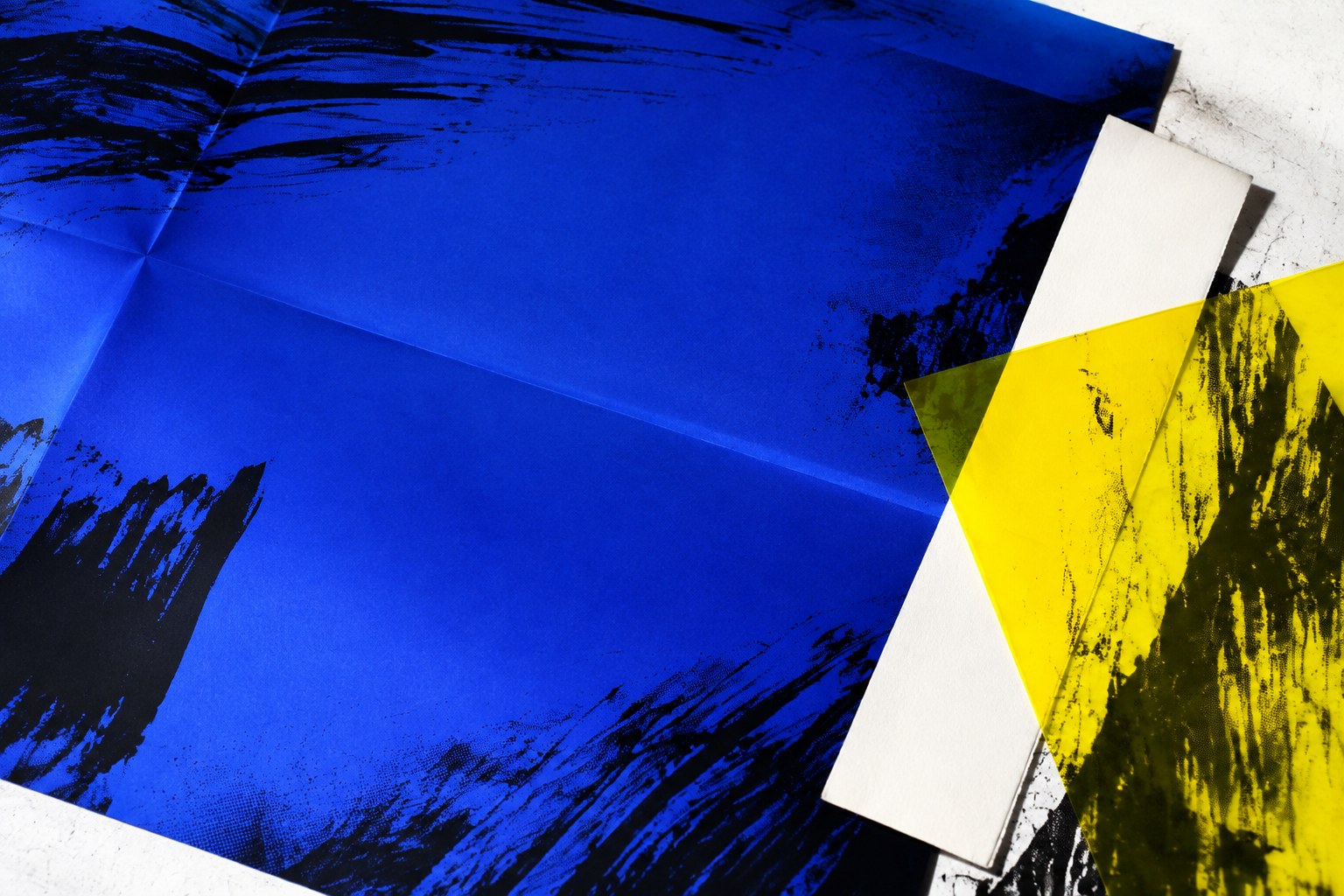 Original blue and yellow printed-paper composition with black ink gestures